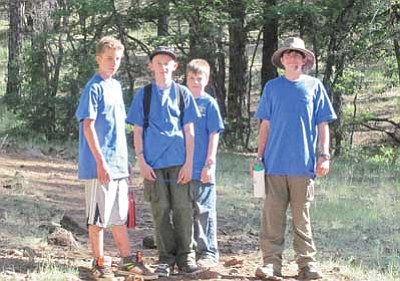 Submitted photo<br>
Braden Heap, Jeffrey Ellico, Tim Rautenberg and Kyle Watson all earned three to four merit badges ranging from wood carving to wilderness survival.