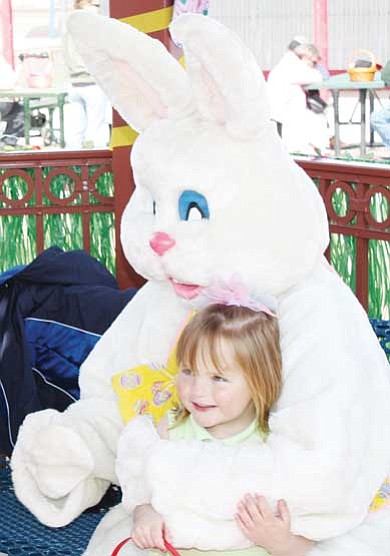 Photo/WGCN<br>
A happy Easter egg hunter takes a time out to pose with the Easter bunny at last year’s Eggstravaganza event.