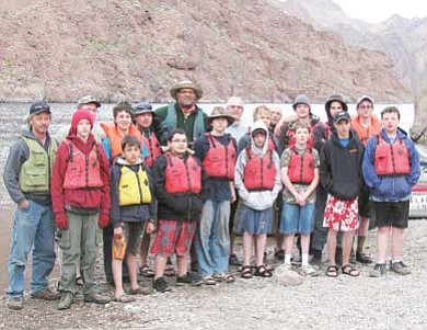 Submitted photo<br>
Members of Boy Scout Troops 138 and 140 take a break on a beach during a four-day canoe journey on the Colorado River. Scouts that attended include Jeffrey Ellico, Braden Heap, Derrick Johnson, Colton Adams, Mariano Rodriguez, Braxton Brinkworth, Kyle Watson, Chris Shelton, Rafael Hernandez and Trevor Adkins. Adult leaders include Howard Jackson, Tom Hooker, Tod Skinner, Bryan Watson, Dillon Brancato, Mike Brinkworth, Filiberto Jaffo, Beau Bowdon and Kurt Johnson.