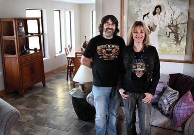 Ryan Williams/WGCN<br>
Sheridan House Inn owners Nick and Claire Kirby stand in the renovated living room.