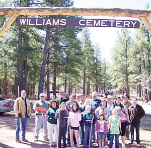 Todd Helgeson/Submitted Photo <br /><br /><!-- 1upcrlf2 -->The Williams Rotary Club and community members take a break after cleaning Williams Cemetery during 2010 spring’s cleanup day. Pictured are Rotarians Roxen Cureton, Bill Miller, Patricia Helgeson, Ken Lollich, Todd Yung, Anna Dick, Kevin Young, Gary McCarthy and Brian Prager; Multicultural Alliance Mexican Independence Day Royalty 2010 Queen Andrea Ayala and 2011 contestant Elena Gutierrez; Williams Girl Scout Troop No. 2616 members Jocelyn Ortega, Caitlyn Fritsinger, Madison Jensen, Cayla Fritsinger and Cassity Kearly and troop leaders Peggy Jensen and Michelle Bliss; and community volunteers Jim Jensen and Todd Helgeson.
