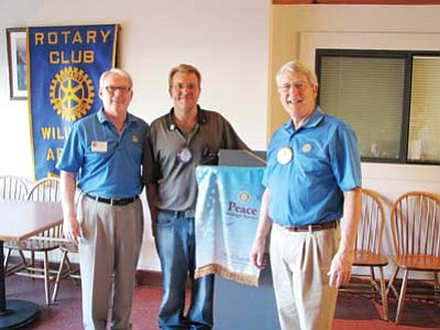 rotary governor district peace through urges service wilson williams