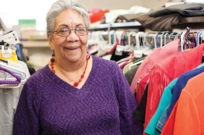 Maria Leonet takes a break from her volunteer job in the Williams Senior Center thrift store. Ryan Williams/WGCN
