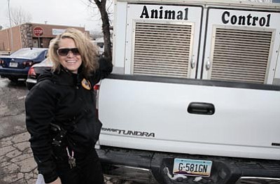 Animal Control Officer Leah Payne stands next to her new truck. Ryan Williams/WGCN