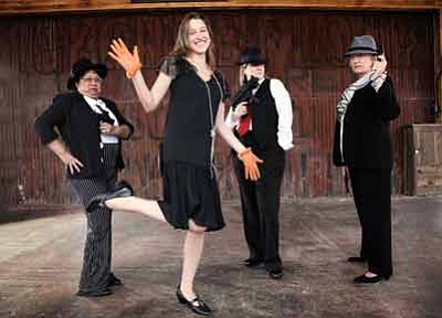 The Williams-Grand Canyon Chamber of Commerce’s Pimi Bennett, Alicia Raecke, Gioia Goodrum and Jan Shirley channel their inner gangsters and flappers in preparation for the April 27 Roaring 20s Speakeasy event in Williams. Ryan Williams/WGCN