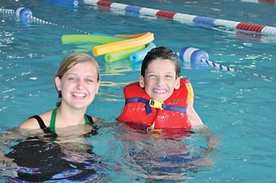 Above and below: campers and counselors enjoy a variety of activities at Camp Civitan including swimming at the Williams Aquatic Center, art projects, gardening and more. Photos/Megan Reddell