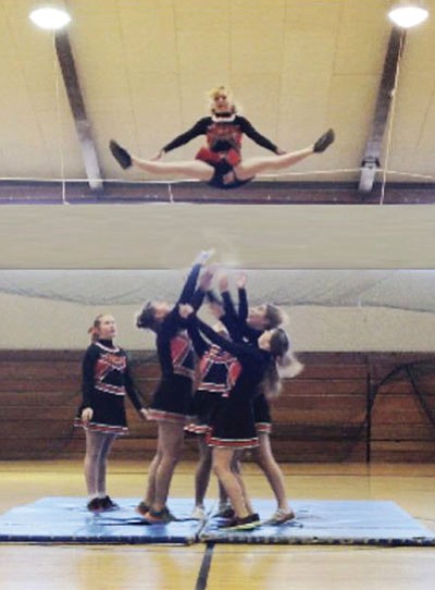 The Williams Elementary-Middle School cheer team practices a basket toss during a recent practice session. Submitted photo