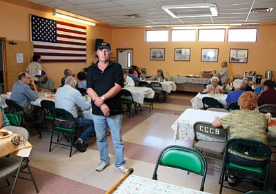 Williams Senior Center Director Max Bishop stands among the lunchtime rush. Bishop retired from the center last Friday. Ryan Williams/WGCN