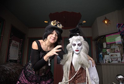 Medium Paige Bruening with a “ghost” in front of the Sultana Theater.  Ryan Williams/WGCN