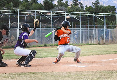 Williams Viking Zack Perkins ducks to miss an inside pitch during a game against Sedona.  Wendy Howell/WGCN