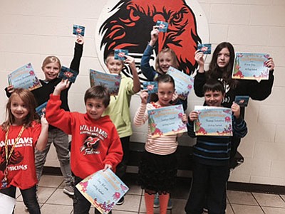 Williams-Elementary Middle School students receive Dairy Queen gift certificates for their writing submissions. Clockwise from top left: Anastasia Christiansen, Nate Fields, Marcie Heap, Elaina Foley, Thomas Gonzales, Joey DiFiore and Rowen Caldwell. Submitted photo