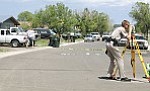 An Arizona Department of Public Safety officer assists the Williams Police Drpartment with the investigation of a fatal accident involving a Williams High School student on graduation day, May 27.
