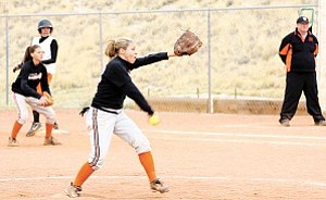 Lady Vikings varsity pitcher Michelle Sandoval launches one at a Wells team batter at the March 10-11 Laughlin tournament where your Lady Vikings took home the championship.