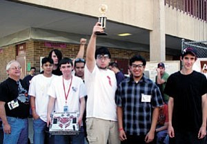Pictured (back row, from left) is Dustin Cushman and Juan Hernandez; (front row) instructor Larry Gutshall, Junior Esparza, Kevin Duffy, Dylan Tobin, Jesus Martinez and William Shaw. ³We¹re looking forward to more competitions,² said a proud Gutshall. For more information or to donate to the Slab Crabs, contact Gutshall at (928) 635-4474.