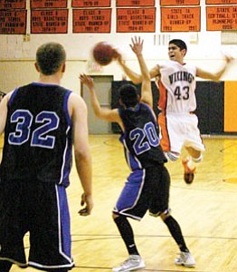 Vikings player Abel Valdez, No. 43, jumps to yet another assist at the Jan. 9 Camp Verde game. Valdez is one of two Williams players that are in the top three scoring spots for all of 2A North.