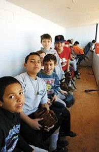 A number of local boys wait for their chance to play ball at the Williams Little League tryouts March 10. A second round of tryouts is scheduled for Saturday.