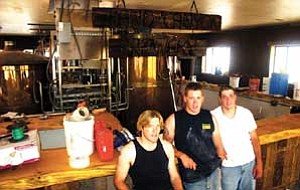 The Peasley brothers say they hope to have the Grand Canyon Brewery ready for business in early July. Pictured from left to right are Josh, John and Jeremy Peasley.

