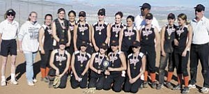 The Lady Vikings Softball Team is all smiles after winning a tournament March 8 in Laughlin, Nev. Standing, from left, are Coach Ann Wells, manager Samantha Scott, Chardell Bennett, Erin McNelly, Shaunni Tanori, Jenise Pettit, Tasha Bowden, Alyssa Gaines, Jenifer Sandoval, Coach Edgar Brown, Taylor Gravill, Kassie Pettit, Darrian Quasula and Coach Tim Pettit. Kneeling, from left, are Ashley Bean, Leticia Aguilar, Amanda Bean, Christina Hernandez and Alma Hernandez.