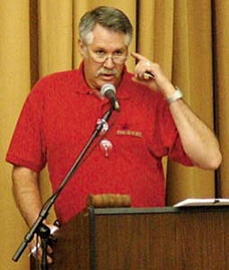 Charlie Bassett speaks to the audience during a May 2007 town hall meeting. Bassett believes more time is needed to review the current proposed action plan.