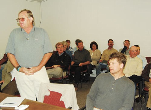 Patrick Whitehurst/WGCN <br>
Hydrologist Don Bills (standing) speaks to Williams City Council members during their regular meeting May 22.