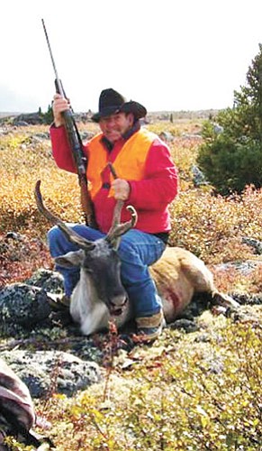 Bob Dean poses proudly with the caribou he bagged on his 70th birthday in Quebec, Canada. Bob and his son, Delbert, spent six days on the tundra approximately 1,000 miles north of Montreal.