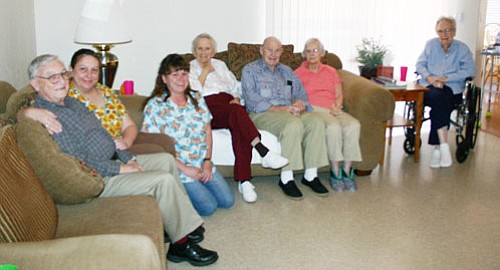 <br>Patrick Whitehurst/WGCN<br>
Pictured from left to right is Howard Booth, Pamela Norman, Carol West, Phyllis Bilharz, Jack and Darlene Bailey and Barbara Matthes at the Ponderosa Assisted Living home in Williams (pictured below).