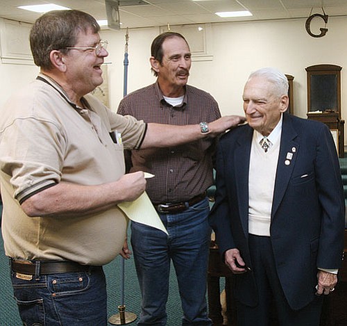 <br>Scott Warren/Scott’s Pics, Photos and Portraits<br>
Buford Belgard (right) received his 50-year pin last weekend, marking half a century and more than half his life as a member of the Masons. Presenting was Williams Lodge 38 Master Don Galyon (left) and Lodge member and Mayor John Moore.