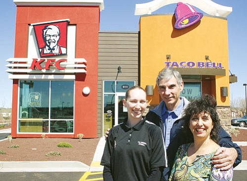 <br>Patrick Whitehurst/WGCN<br>
Pictured from left to right is Store Manager Crystal Decknick and owners Craig and Alyson Fritsinger. The combination Taco Bell/Kentucky Fried Chicken will open Monday.