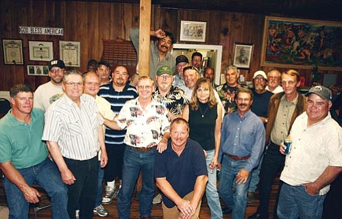 <br>Photo/Tim Johnson<br>
Friends and family celebrate the retirement of Dennis Johnson (center) Sept. 19 at the Williams Legion Hut.