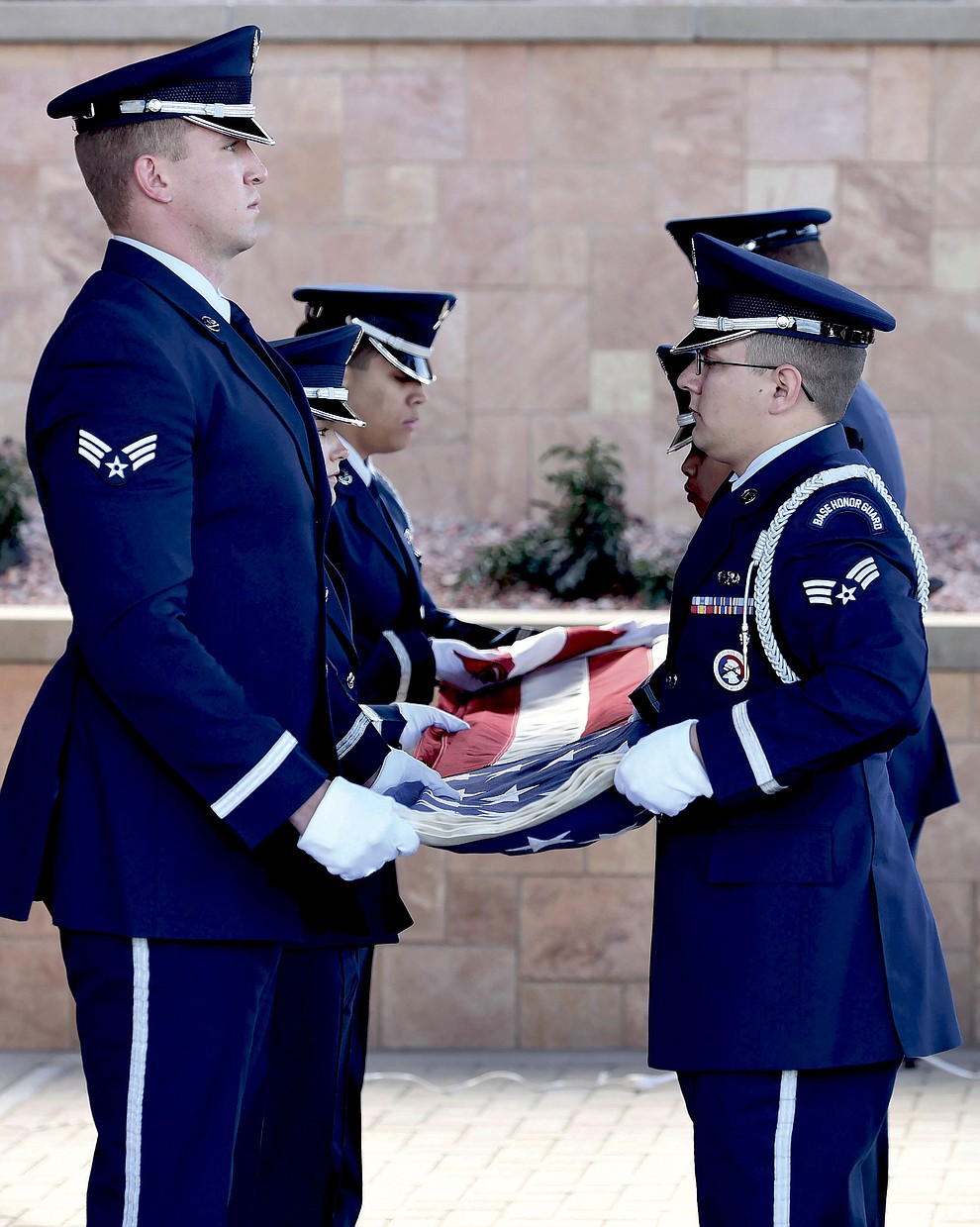 Members of the Luke Air Force Base Honor Guard fold an American flag at the Prescott National Cemetery during the funeral for Air Force Brigadier General Duane Harold "Leif" Erickson in Prescott.