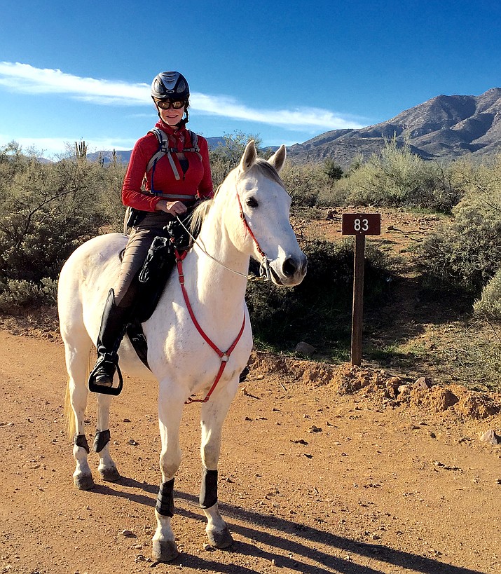 Carol Fontana and “Tiki” scout one of the segments of the Arizona Trail. They will tackle the 800-mile adventure with a straight-through ride, a first for the grueling border-to-border trail.