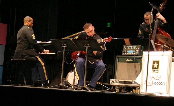 Master Sgt. Tim Young on piano, left, Staff Sgt. Jonathan Epley on guitar and Staff Sgt. Hamilton Price on bass perform during The Jazz Ambassadors concert Sunday, March 6, in Prescott.