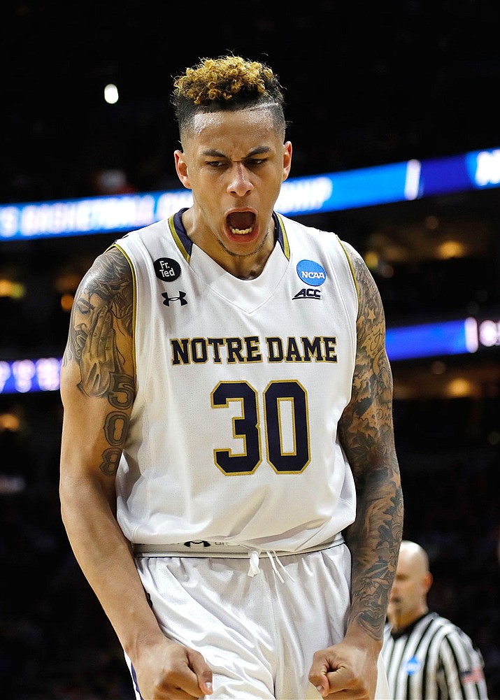 Notre Dame’s Zach Auguste reacts during the second half of the team’s game against Wisconsin in the regional semifinals of the men’s NCAA Tournament on Friday in Philadelphia.