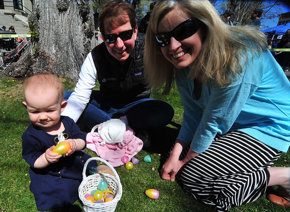 Cecily, one, Ben and Holly Britt from Washington D.C. scored some eggs in the four and under egg hunt during the Great Prescott Easter Egg Hunt Saturday morning on the Yavapai County Courthouse Plaza.(Les Stukenberg/The Daily Courier)