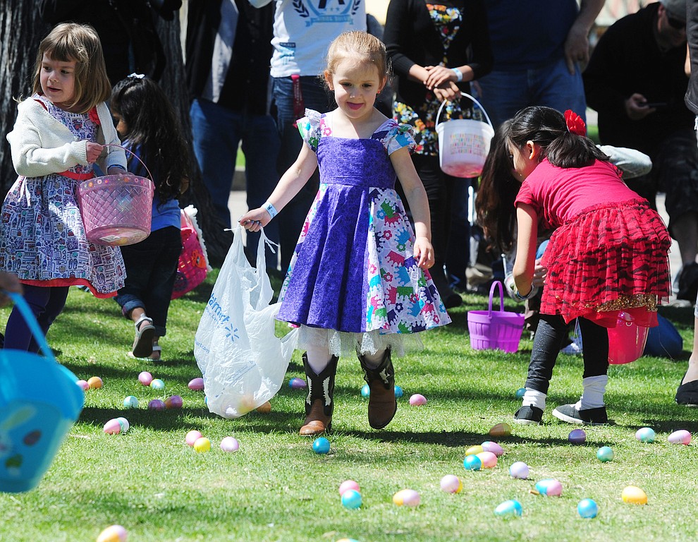 Four and unders head out to collect eggs during the Great Prescott Easter Egg Hunt Saturday morning on the Yavapai County Courthouse Plaza.(Les Stukenberg/The Daily Courier)
