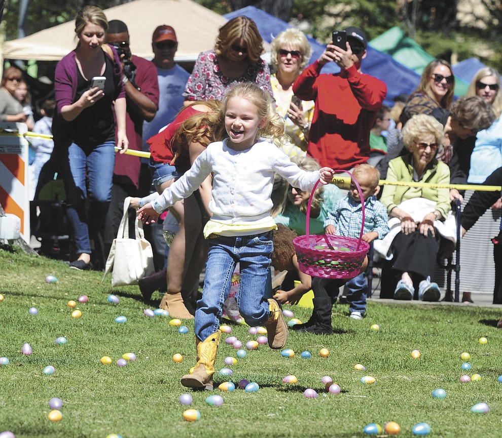 Four and unders head out to collect eggs during the Great Prescott Easter Egg Hunt Saturday morning on the Yavapai County Courthouse Plaza.(Les Stukenberg/The Daily Courier)
