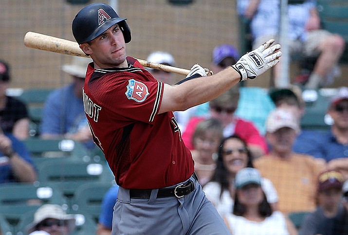 Arizona Diamondbacks' Paul Goldschmidt singles against the Colorado Rockies during the third inning of a spring training baseball game in Scottsdale, Thursday, March 31.