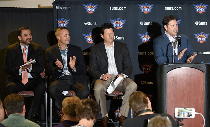 Phoenix Suns President Jason Rowley, right, announces their new D League team the Northern Arizona Suns Tuesday morning April 12, 2016 at the Prescott Valley Event Center while from left, Mike Paredes Executive Director of the Prescott Valley Economic Development Foundation, Brad Fain, CEO of Fain Signature Group and Bubba Burrage, General Manager of the Northern Arizona Suns listen in at the Event Center in Prescott Valley. (Matt Hinshaw/The Daily Courier)