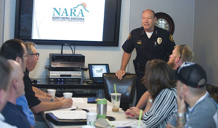 Prescott Police Chief Jerald Monahan thanks members of the Northern Arizona Recovery Association for their cooperation during their monthly meeting in Prescott Thursday morning.