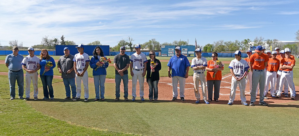 From right, Chino Valley baseball team seniors Manager Garrett King, Israel Acosta, Trevor Drake, Jake Clawson, Jared Tippit, and Spencer Coffin gather for a photo with their family, friends, and teammates before their final regular season home game against Mohave Tuesday afternoon April 19, 2016 at Chino Valley High School. (Matt Hinshaw/The Daily Courier)