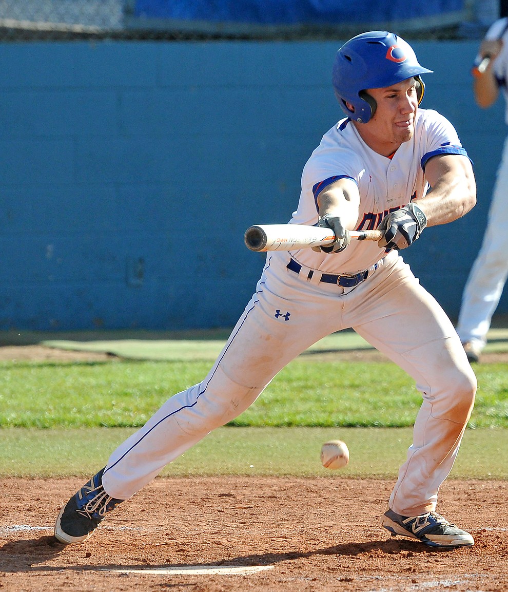 Chino Valley's Spencer Coffin (25) lays down a bunt Tuesday afternoon April 19, 2016 while playing their last regular season home game against Mohave at Chino Valley High School. (Matt Hinshaw/The Daily Courier)