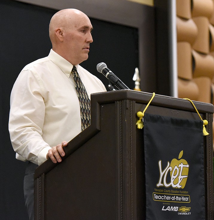 Mike Westcott a Mingus Union High School chemistry teacher and the 2016 Yavapai County Teacher of the Year gives a quick speech after winning the award Friday night April 22, 2016 at the Prescott Resort. (Matt Hinshaw/The Daily Courier)