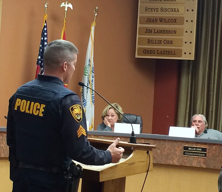 Brian Dever of the Prescott Police Department responds to questions from the Mayor’s Ad Hoc Committee on Structured Sober Living Homes Wednesday, April 27, while committee members Lauren Newington, center, and Tom Montague, right, look on.

