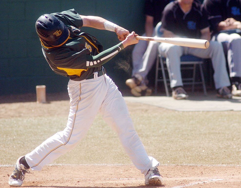 Yavapai's Gavin Johns launches a long homer over the center field fence in the first game of the NJCAA Region 1 Division 1 semifinals Thursday in Prescott. (Les Stukenberg/The Daily Courier) (Les Stukenberg/The Daily Courier)