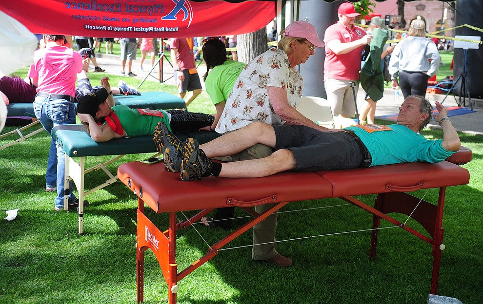 What better way to relax than a massage following the 38th annual Whiskey Row Marathon Saturday morning in Prescott. (Les Stukenberg/The Daily Courier)