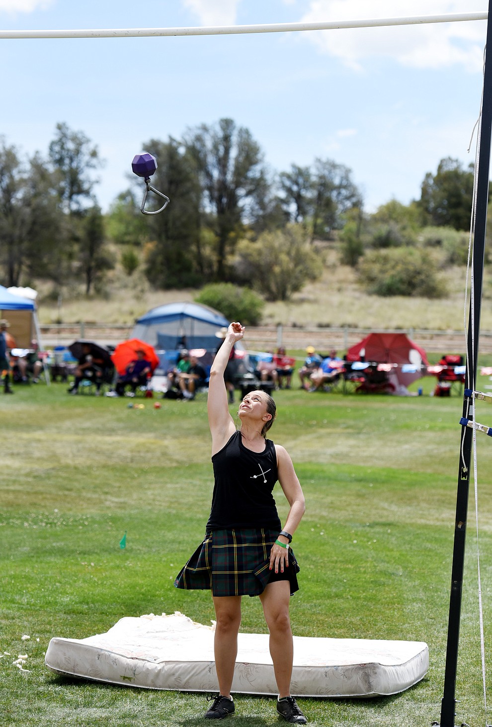 A contestant throws a "weight over bar" during the 2016 Highland Games Saturday morning in at Watson Lake Park in Prescott. (Les Stukenberg/The Daily Courier)