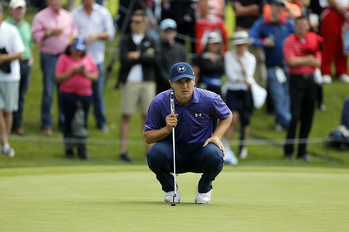 Jordan Spieth lines up a putt on the second green during the opening round of the Byron Nelson golf tournament, Thursday, May 19, in Irving, Texas.