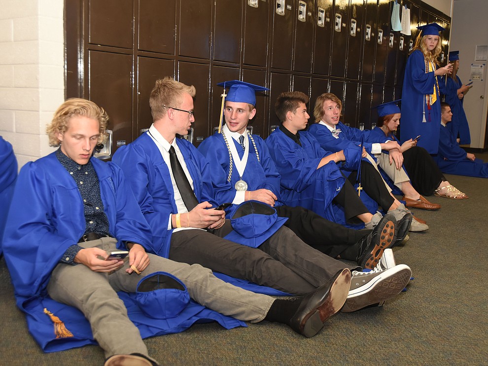 Relaxing before Prescott High School holds their Commencement Ceremony for the Class of 2016 on May 27, 2016.  (Les Stukenberg/The Daily Courier)