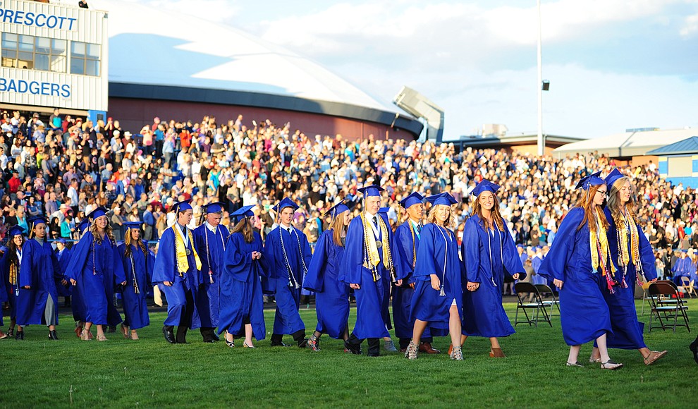 Students walk in the processional as Prescott High School holds their Commencement Ceremony for the Class of 2016 on May 27, 2016.  (Les Stukenberg/The Daily Courier)