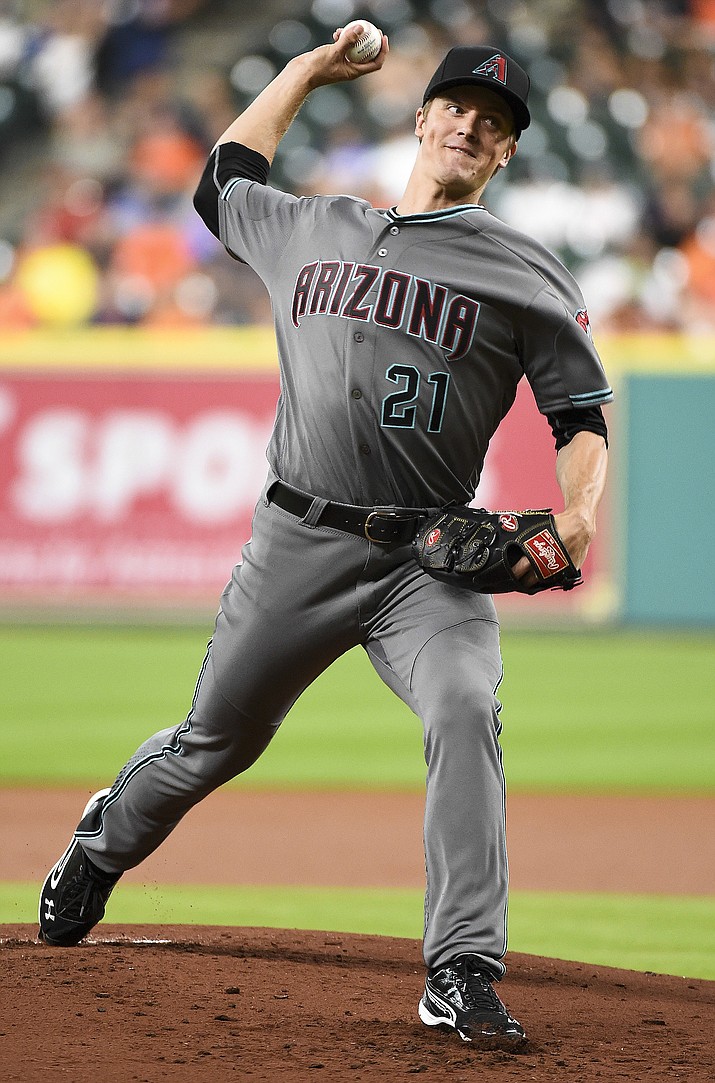 Zack Greinke delivers a pitch against the Houston Astros, Thursday.
